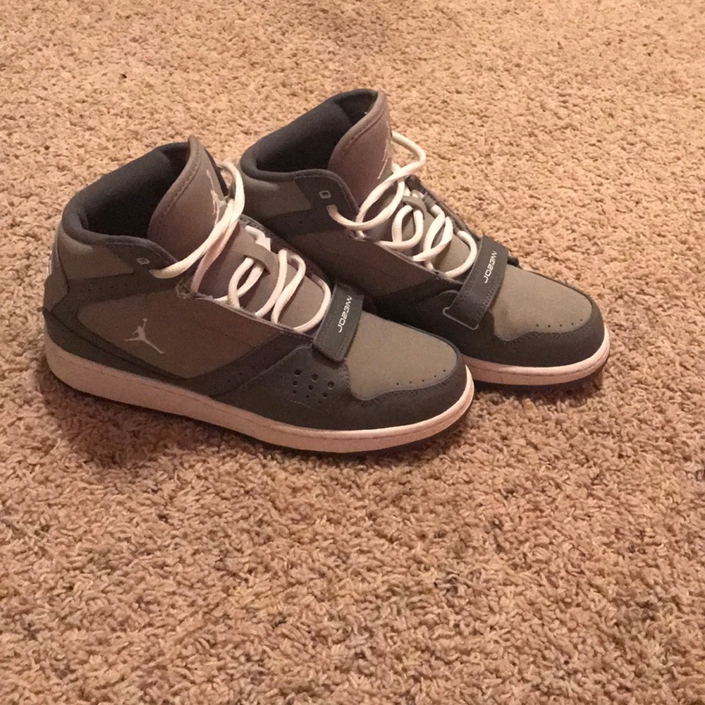 Boys gray and white fairly used Jordan’s.